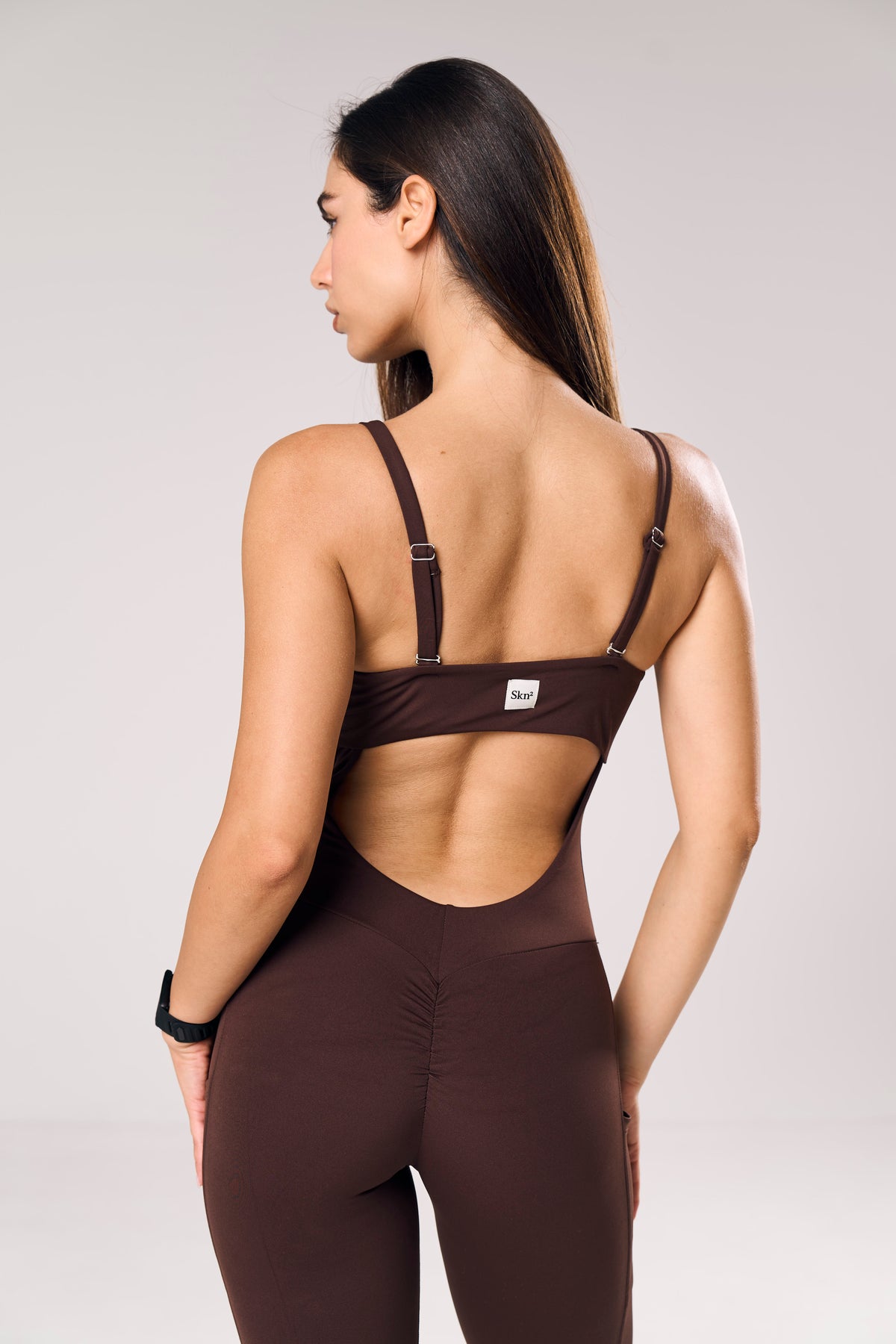 Minx Two-Way Sculpt Jumpsuit in chocolate — Skn² women's gym jumpsuit (view 7)
